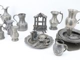 a lot of silver items that are on the table