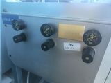 a machine that has a lot of knobs on it