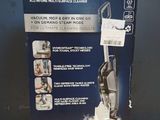 the box of the bissell crosswave pet and select vacuum is open