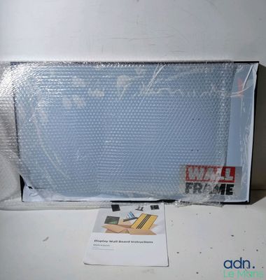 a picture of a box that is wrapped up and sitting on a table