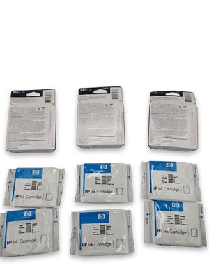 six packages of hp ink cartridges are sitting on a white surface