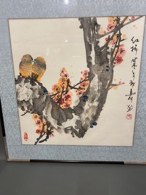 une photo d'une photo d'un oiseau dans un arbre