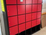a large red locker in the middle of a room
