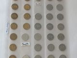a lot of coins in a plastic bag on the table