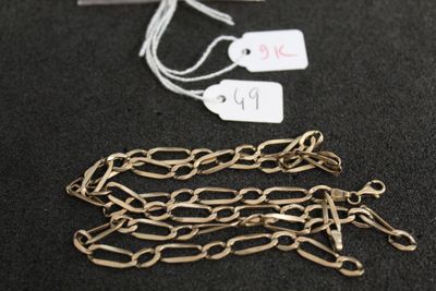 a close up of a metal chain with tags on it