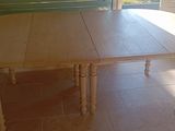 an image of a dining room table in front of a window