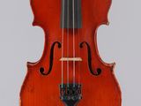 an old violin with a bow hanging from it ' s neck