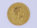 an image of a gold coin with a woman ' s head on it