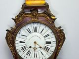 a clock that is sitting on top of a table