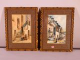 two framed paintings of a street scene with a man walking down the street