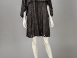 une robe de mannequin en dentelle noire sur un mannequin mannequin mannequin mannequin mannequin mannequin mannequin mannequin mann