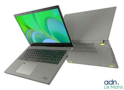 two open laptop computers sitting side by side on a white surface