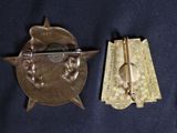 a small metal object with a small metal object on top of it