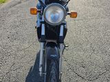 a motorcycle that is parked on the side of the road