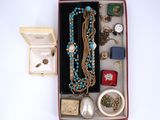 a box of jewelry that is sitting on a table