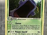a close up of a pokemon card on a table