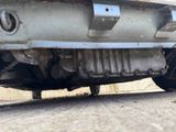 a close up of a car ' s exhaust pipe and exhaust pipe