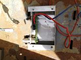 a metal box with wires and wires attached to it