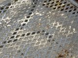 a metal table with a hole in the middle of it
