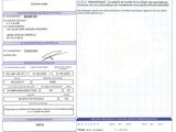 a close up of a document with a picture of a person on it
