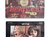 the beatles let it be vinyl album with a picture of a group of people