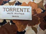 a picture of a label that says torrente haute boutique paris