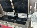 an image of a commercial grill in a kitchen