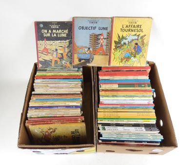 a lot of books in a cardboard box on the table
