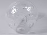 a clear glass ball with a hole in the middle