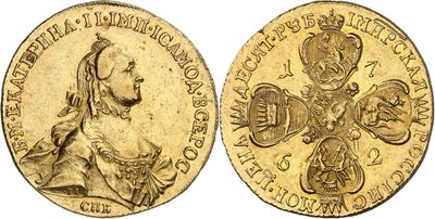 an image of a gold coin with the image of a woman holding a baby