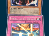 two cards that are in a box on the table