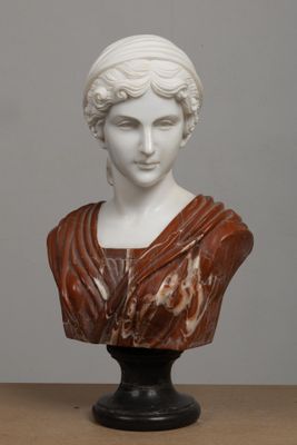 marble bust of a woman wearing a red dress