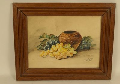 une peinture à l'huile représentant des raisins et une corbeille de raisins posée sur une table