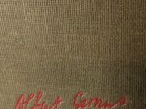 a picture of a book with a red writing on it
