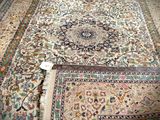 a large oriental rug on the floor in a room