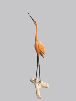 un oiseau perché sur un morceau de bois
