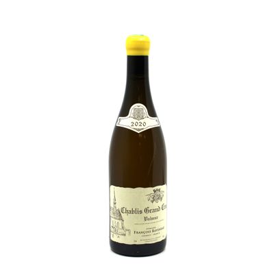 a bottle of wine that is sitting on a table