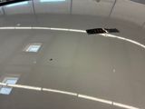 a remote control on top of a car in a garage