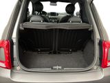 the back of a car with the trunk open and the seats down