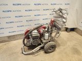 an image of a motorcycle that is parked in a garage