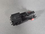 a small toy train that is on the floor