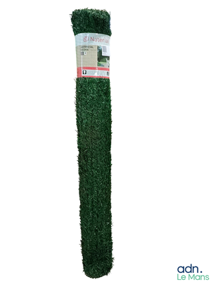 a close up of a roll of green grass on a white background