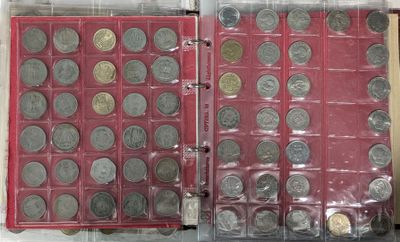 two rows of coins in a plastic case