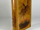 an old book with a picture of a man riding a horse