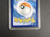 a close up of a pokemon card with a ball in it