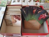 a lot of cards in a box on a table