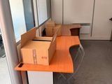 a desk with a box on it in an office