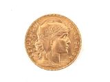 an image of a gold coin on a white surface