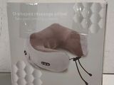 packaging of the u shaped massager pillow in the box
