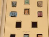 an image of a picture of a collection of stamps on a table